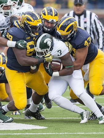 Willie Henry (69) and Chris Wormley (43)