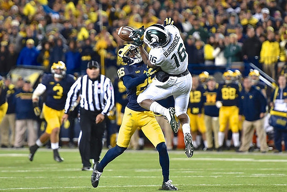 Desmond Morgan (3) and Jourdan Lewis (26)