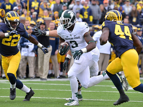 Jarrod Wilson (22) and Delano Hill (44)