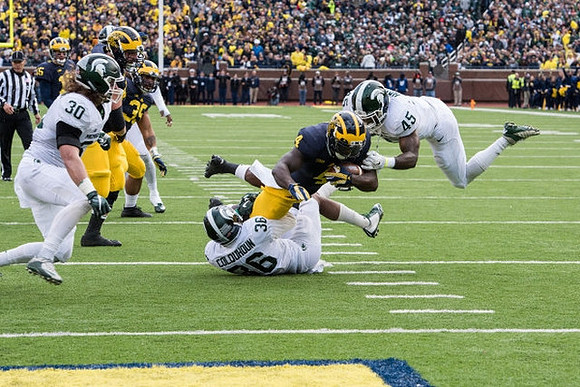 Jake Rudock (15), Sione Houma (39), and De'Veon Smith (4)