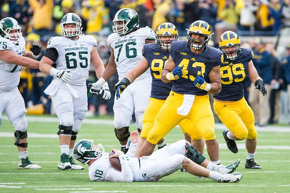 Ryan Glasgow (96), Chris Wormley (43), and Matthew Godin (99)