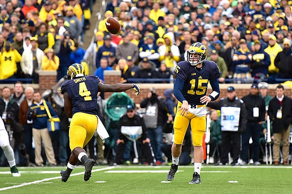 De'Veon Smith (4) and Jake Rudock (15)