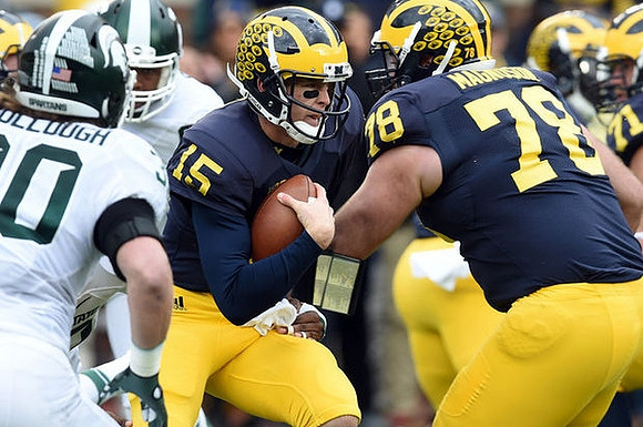 Jake Rudock (15) and Erik Magnuson (78)