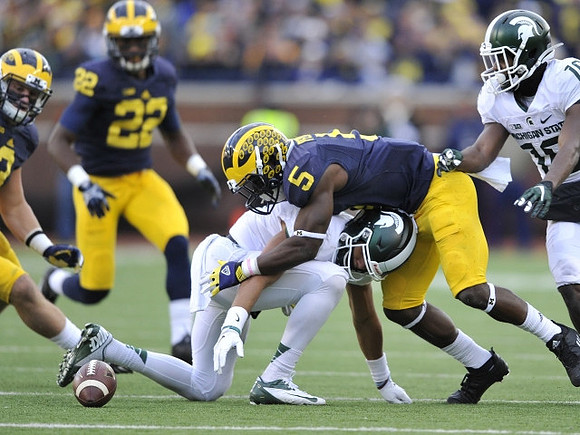 Jarrod Wilson (22) and Jabrill Peppers (5)
