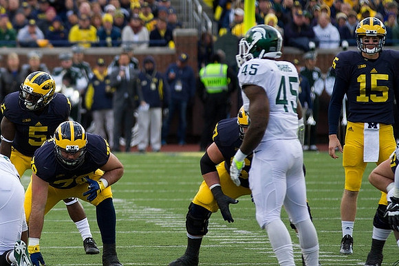Jabrill Peppers (5), Erik Magnuson (78), Kyle Kalis (67), and Jake Rudock (15)