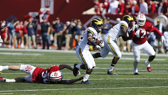 Karan Higdon (22) and Tyrone Wheatley Jr. (17)