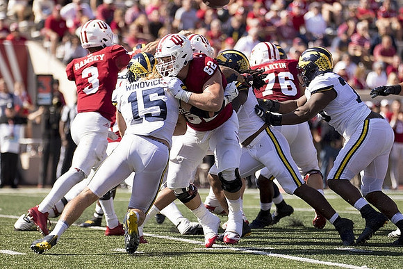 Chase Winovich (15), Devin Bush (10), and Rashan Gary (3)