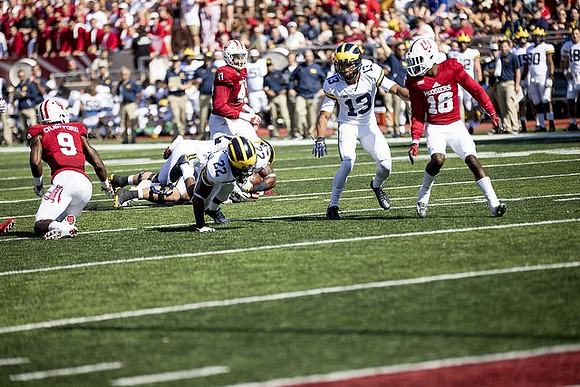 Karan Higdon (22) and Eddie McDoom (13)