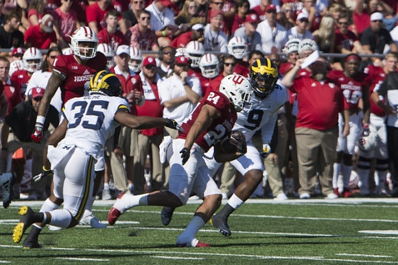 Josh Uche (35) and Mike McCray (9)