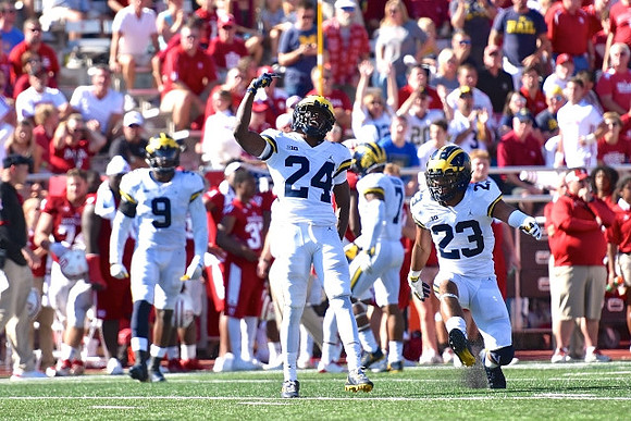 Mike McCray (9), Lavert Hill (24), Khaleke Hudson (7), and Tyree Kinnel (23)