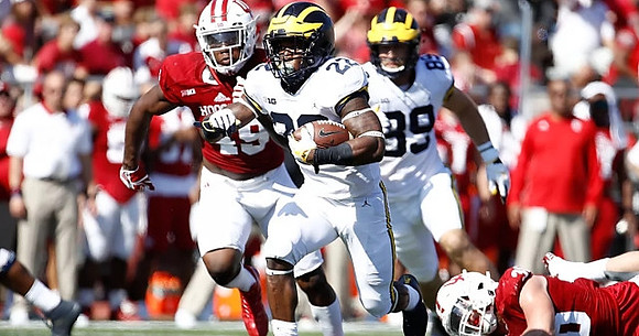 Karan Higdon (22) and Ian Bunting (89)
