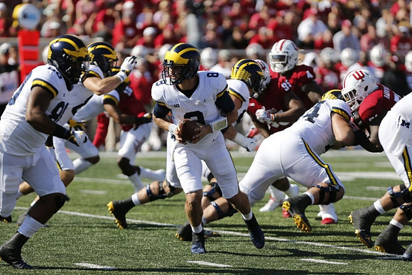 Khalid Hill (80), John O'Korn (8), and Ben Bredeson (74)