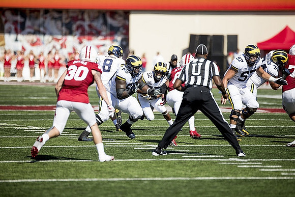 John O'Korn (8), Michael Onwenu (50), Karan Higdon (22), Patrick Kugler (57), and Ben Bredeson (74)