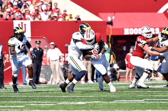 Devin Bush (10) and Mike McCray (9)