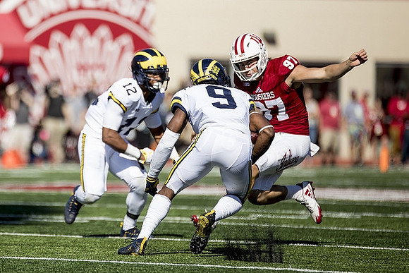 Chris Evans (12) and Donovan Peoples-Jones (9)