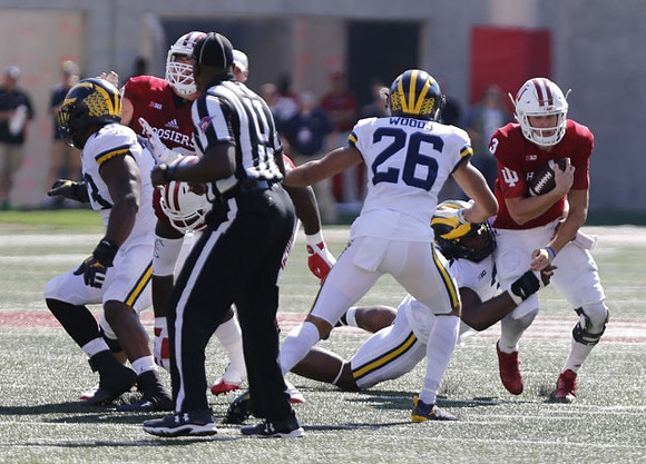 Tyree Kinnel (23), J'Marick Woods (26), and Rashan Gary (3)