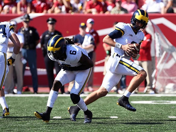 Kareem Walker (6) and John O'Korn (8)