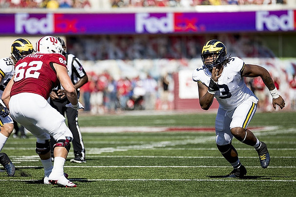 Noah Furbush (59) and Rashan Gary (3)