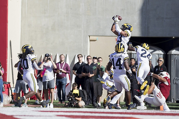 Devin Bush (10), Tyree Kinnel (23), Josh Metellus (14), and Lavert Hill (24)