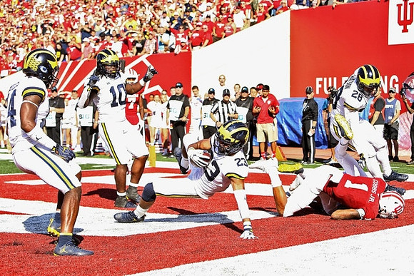 Josh Metellus (14), Devin Bush (10), Tyree Kinnel (23), and Brandon Watson (28)