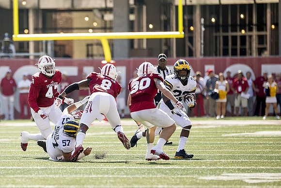 Patrick Kugler (57) and Karan Higdon (22)