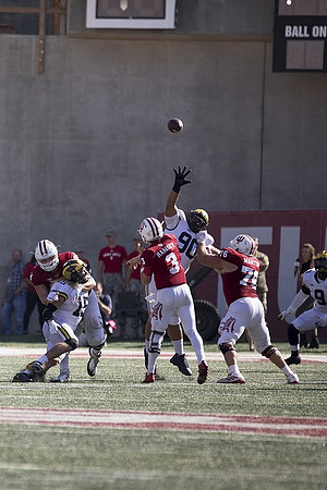 Chase Winovich (15), Bryan Mone (90), and Mike McCray (9)