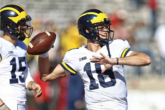 Alex Malzone (15) and Brandon Peters (18)