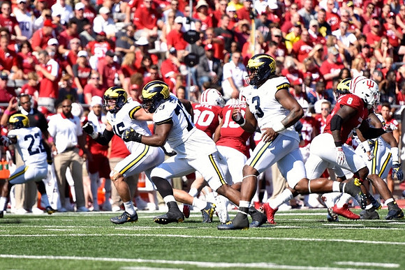 David Long (22), Chase Winovich (15), Maurice Hurst (73), and Rashan Gary (3)