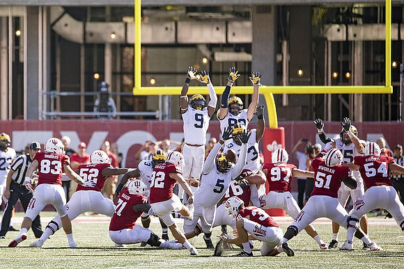 Tyree Kinnel (23), Rashan Gary (3), Mike McCray (9), Aubrey Solomon (5), Zach Gentry (83), and Maurice Hurst (73)