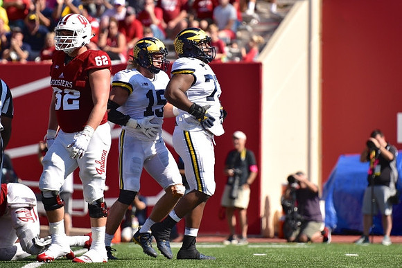 Chase Winovich (15) and Maurice Hurst (73)