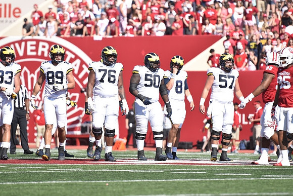 Zach Gentry (83), Ian Bunting (89), Juwann Bushell-Beatty (76), Michael Onwenu (50), John O'Korn (8), and Patrick Kugler (57)