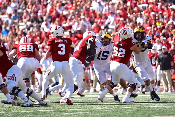 Chase Winovich (15) and Noah Furbush (59)