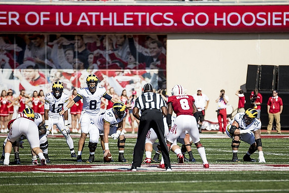Michael Onwenu (50), Chris Evans (12), John O'Korn (8), Patrick Kugler (57), and Mason Cole (52)