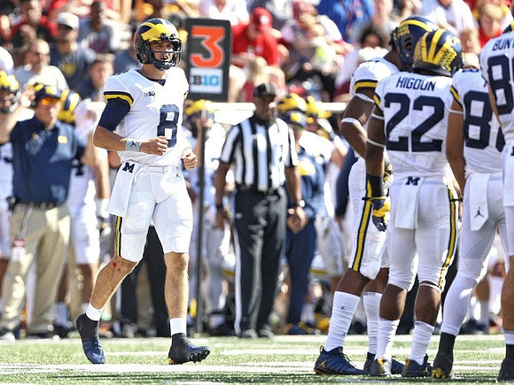 John O'Korn (8), Karan Higdon (22), Grant Perry (88), and Ian Bunting (89)