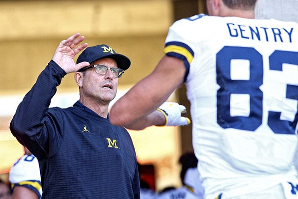 Jim Harbaugh and Zach Gentry (83)