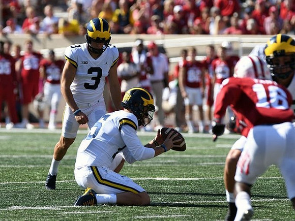 Quinn Nordin (3) and Garrett Moores (15)