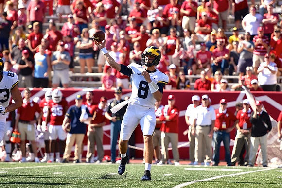 Zach Gentry (83) and John O'Korn (8)