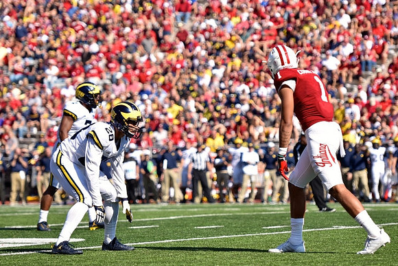 Khaleke Hudson (7) and Brandon Watson (28)