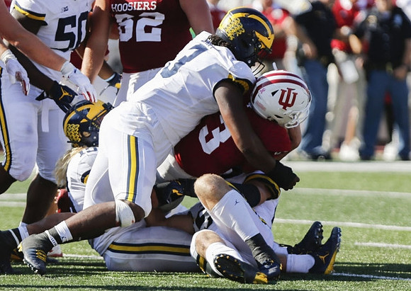 Michael Dwumfour (50), Chase Winovich (15), and Rashan Gary (3)