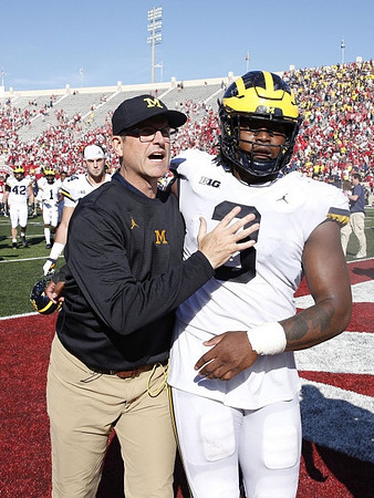 Jim Harbaugh and Rashan Gary (3)