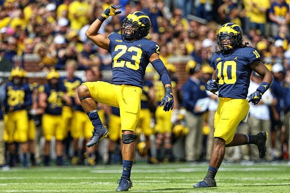 Tyree Kinnel (23) and Devin Bush (10)