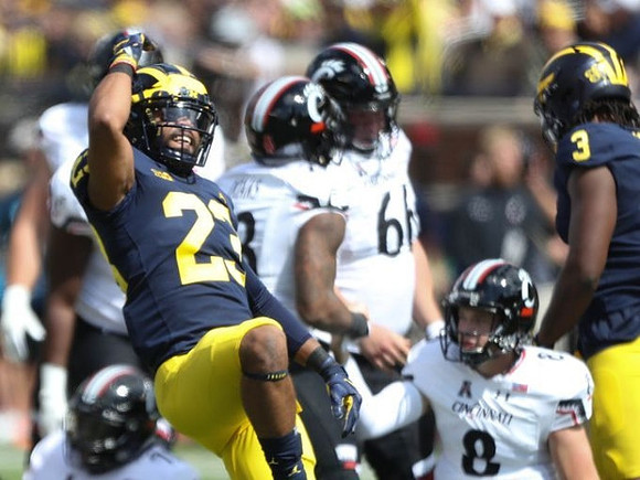 Tyree Kinnel (23) and Rashan Gary (3)