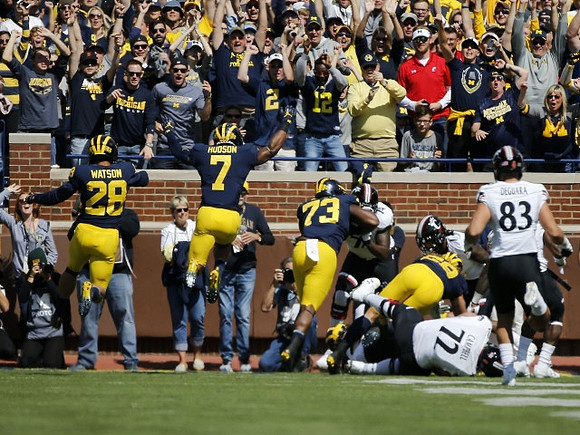 Brandon Watson (28), Khaleke Hudson (7), Maurice Hurst (73), and Noah Furbush (59)