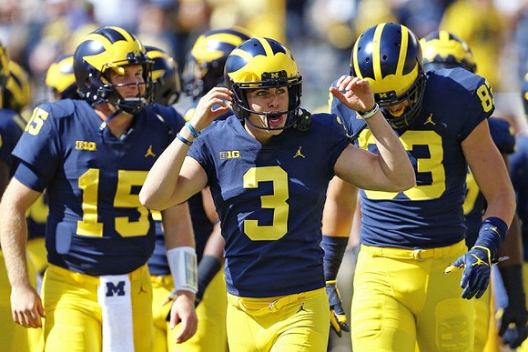 Garrett Moores (15), Quinn Nordin (3), and Zach Gentry (83)