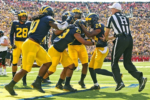 Brandon Watson (28), Devin Bush (10), Tyree Kinnel (23), and Lavert Hill (24)