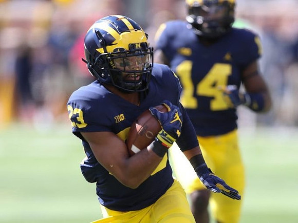 Tyree Kinnel (23) and Josh Metellus (14)
