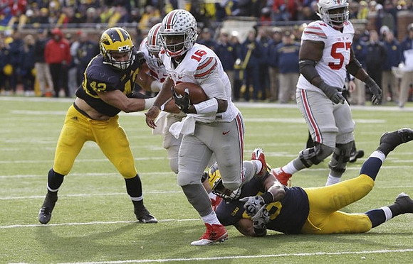 Ben Gedeon (42) and Jabrill Peppers (5)