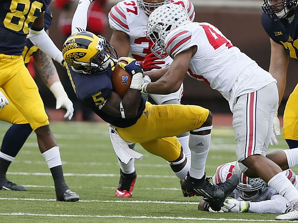 Jehu Chesson (86) and Jabrill Peppers (5)