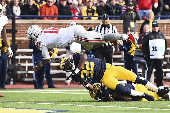 Jourdan Lewis (26) and Jarrod Wilson (22)