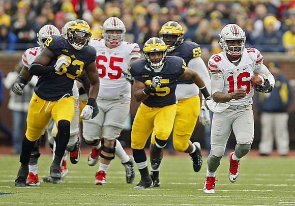 Taco Charlton (33), Dymonte Thomas (25), and Willie Henry (69)